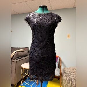 Form-hugging, deep navy sequin dress